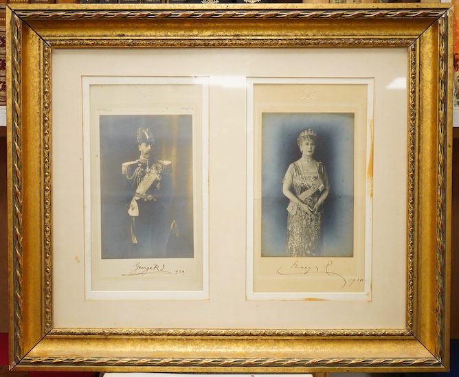 A pair of framed photographs of King George V and Queen Mary, signed by each on the Mount beneath the photograph, and both dated 1930, contained within a gilt frame, overall dimensions 50.5 x 61cm